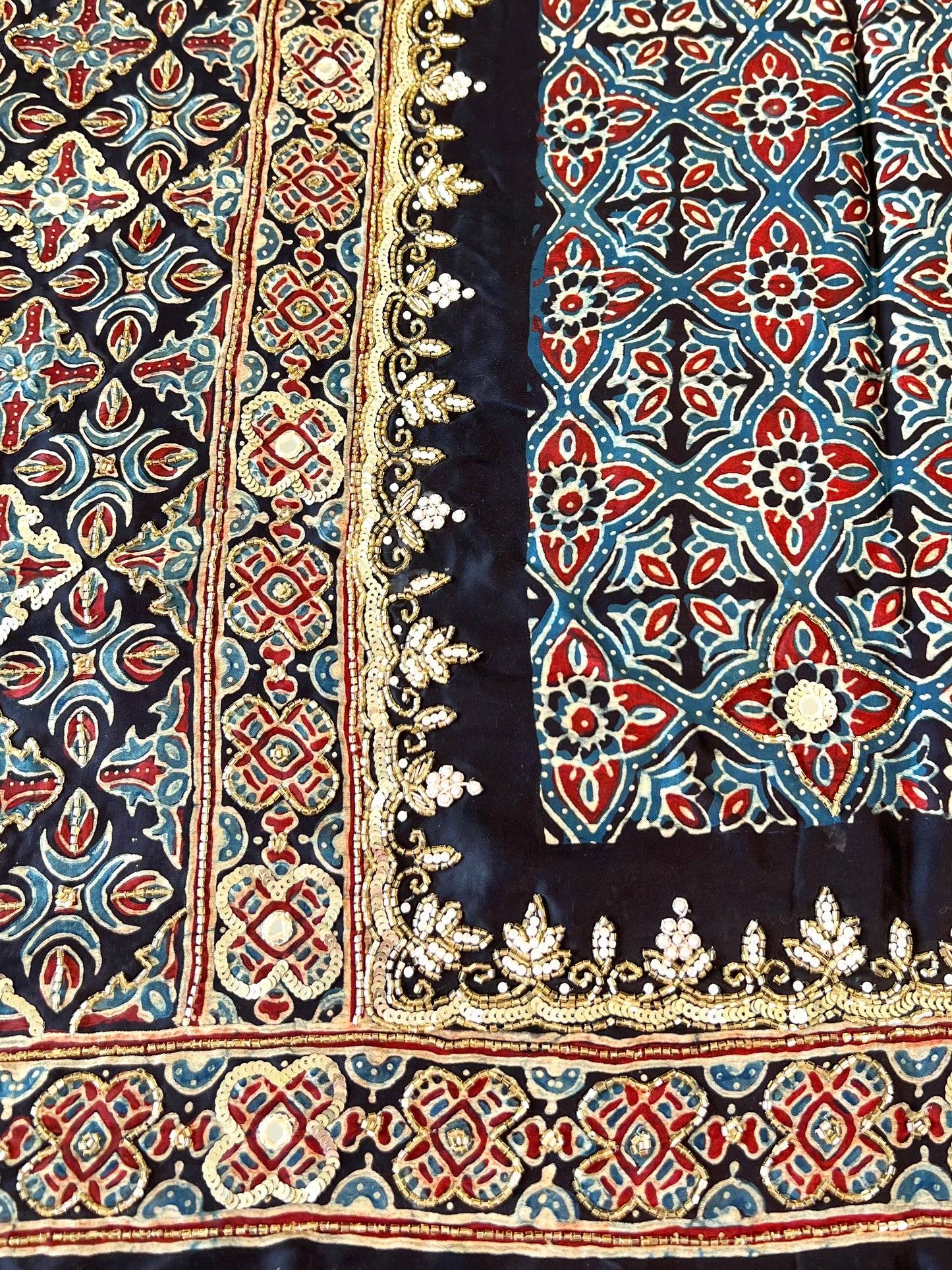 Regal Petals - Pure Modal Ajrakh Hand Embroidered Saree
