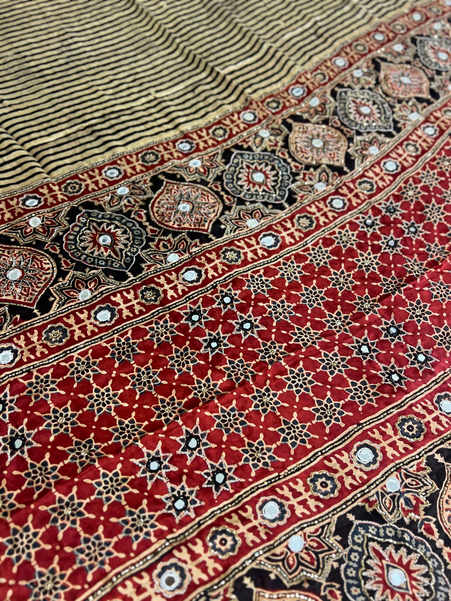 Cream and Black Striped Modal Ajrakh Hand Embroidered Saree with Red and Black Motifs