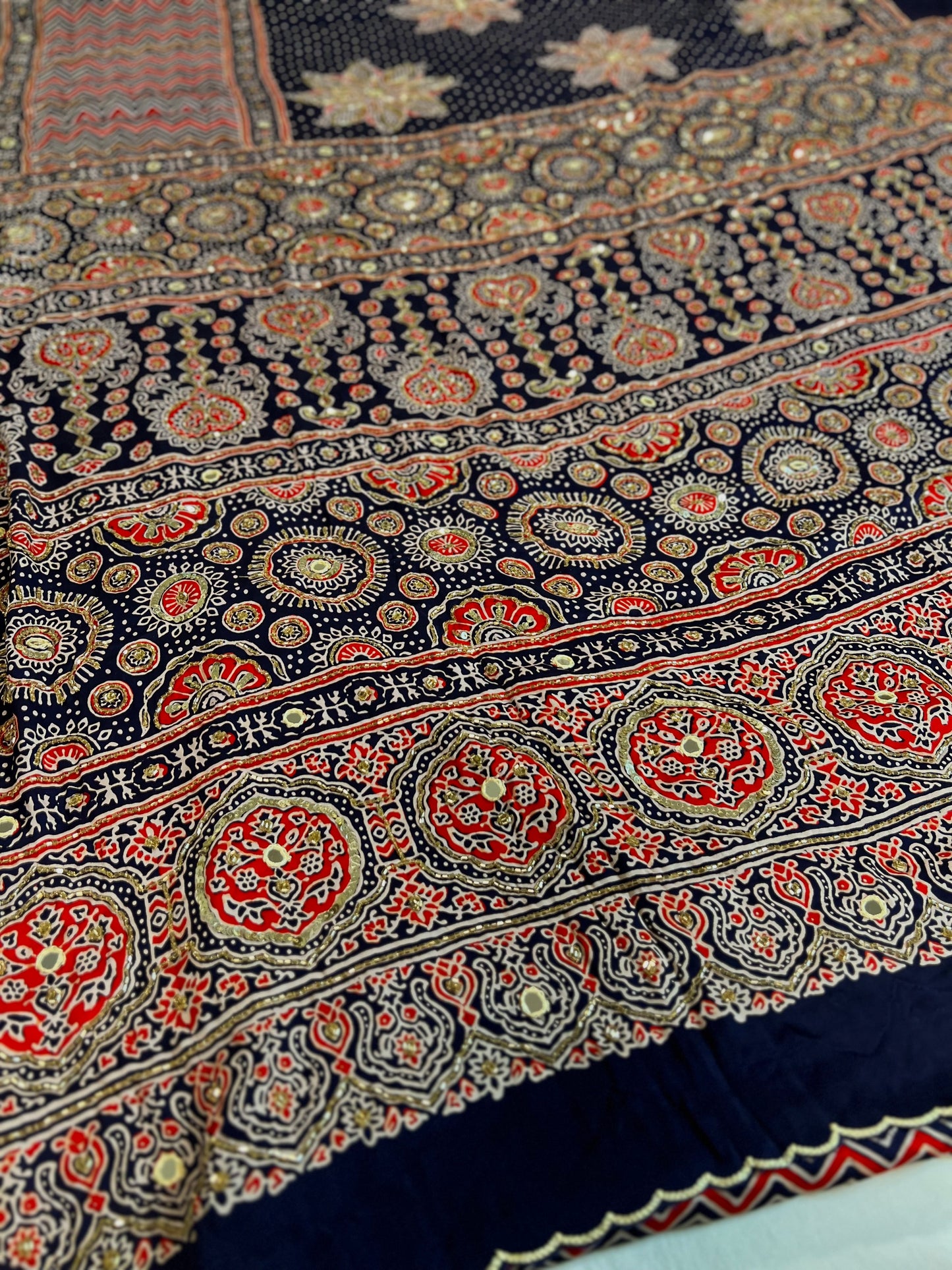 MIDNIGHT BLOSSOM - Pure Modal Ajrakh Hand Embroidered Saree