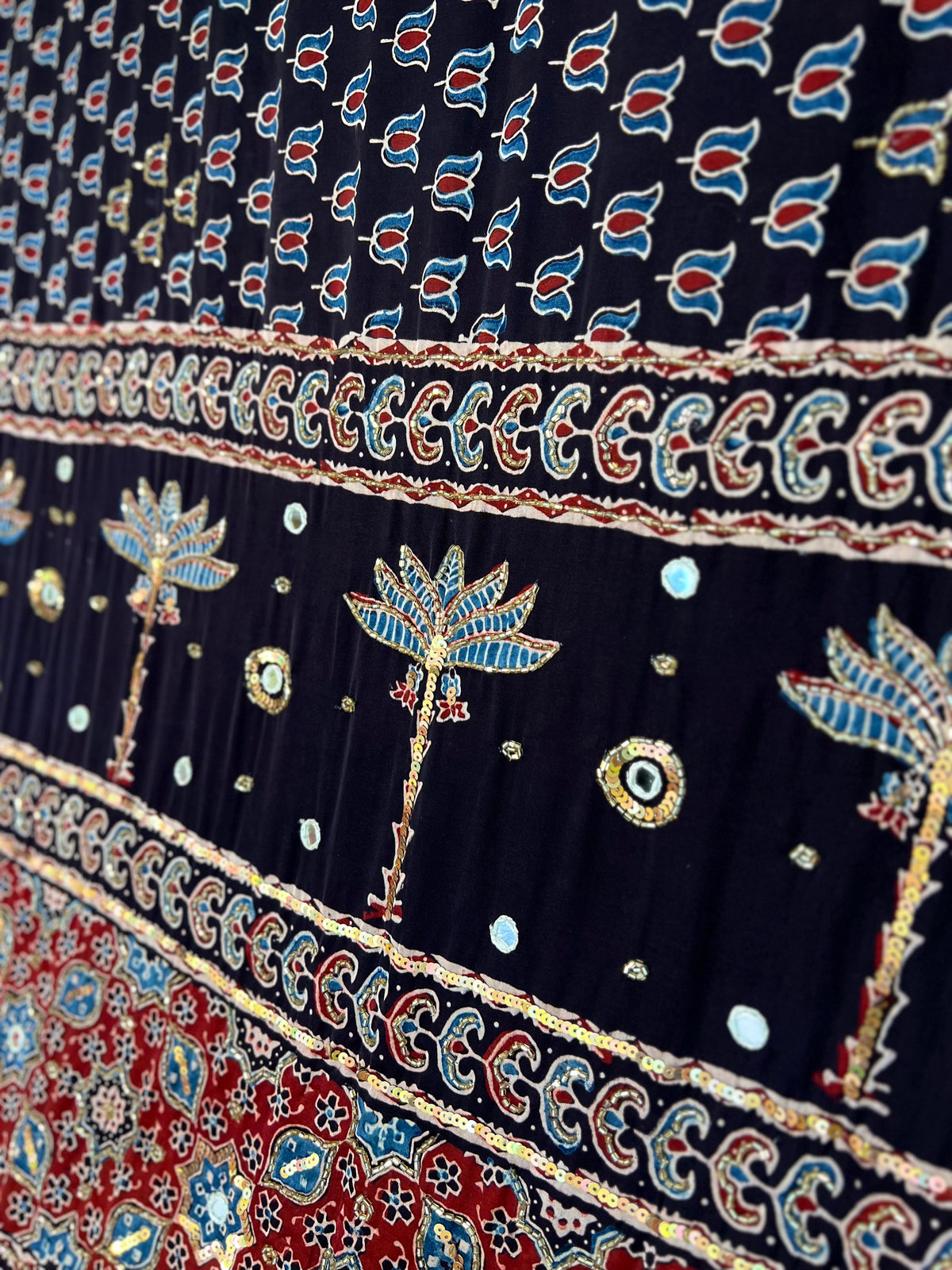 EBONY BLOSSOM - Pure Modal Ajrakh Hand Embroidered Saree