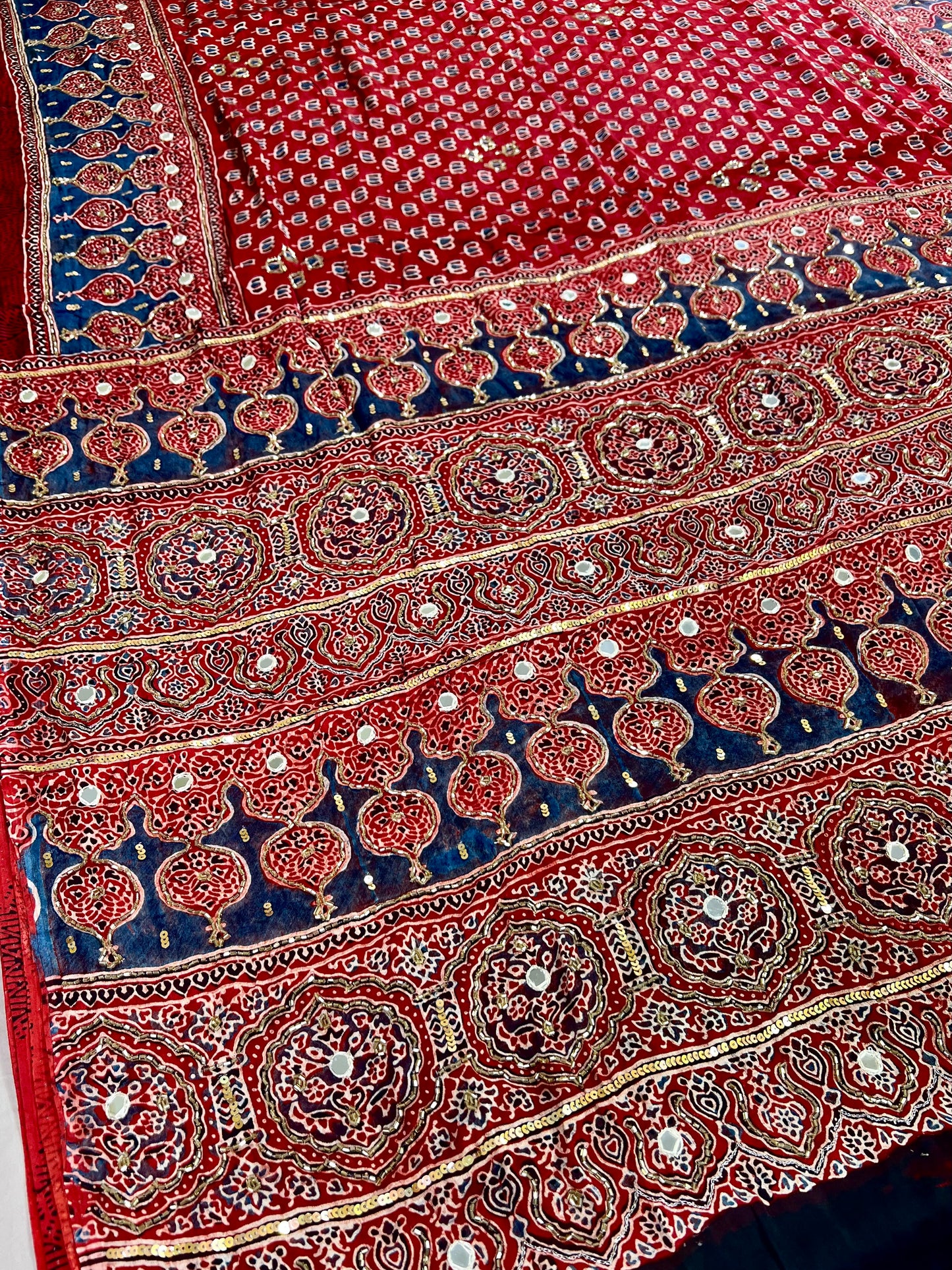 CRIMSON LOTUS - Pure Modal Ajrakh Hand Embroidered Saree