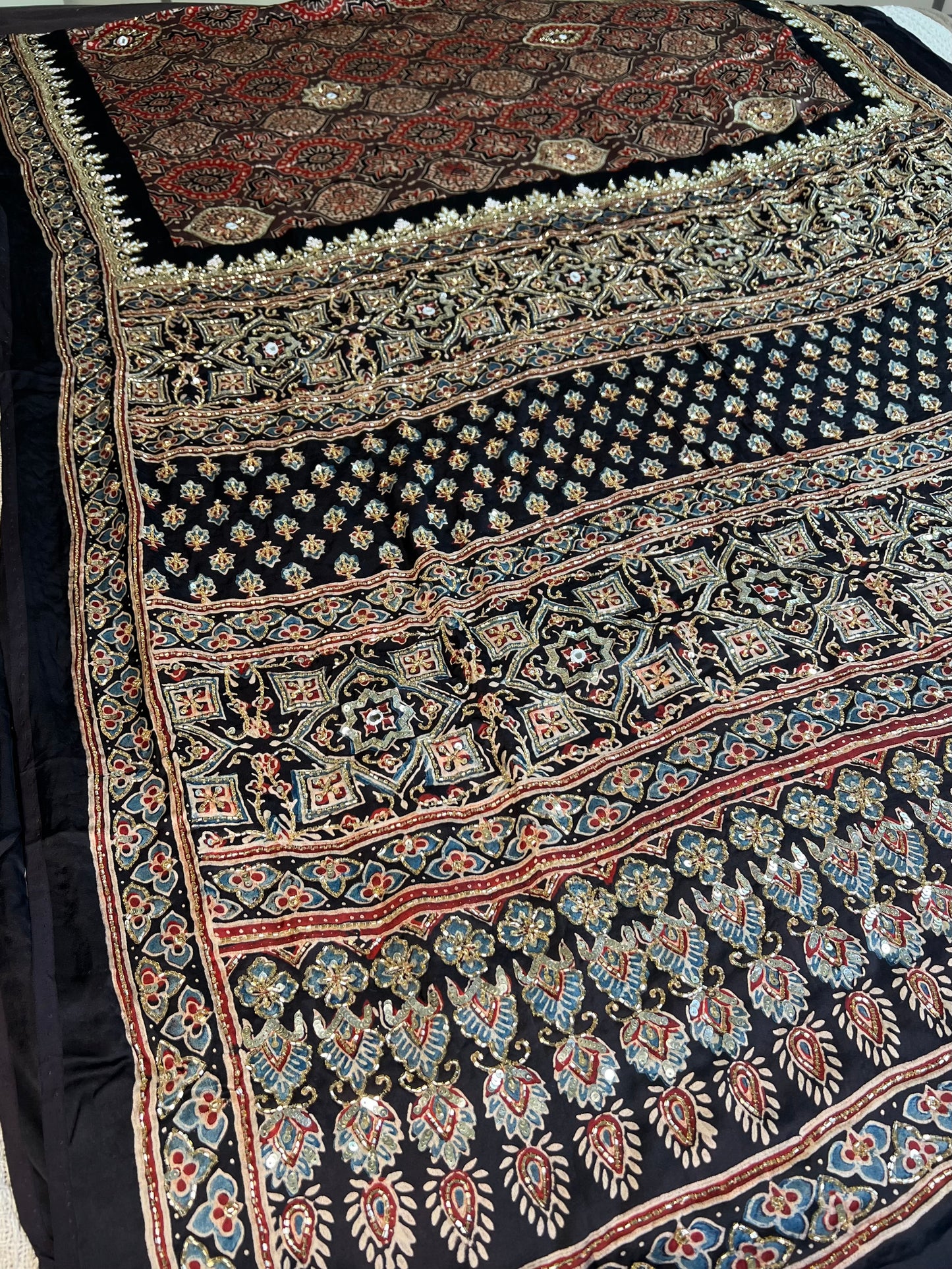 Rustic Hues - Pure Modal Ajrakh Hand Embroidered Saree