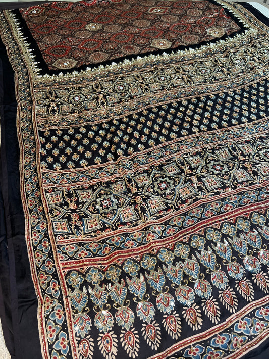 Rustic Hues - Pure Modal Ajrakh Hand Embroidered Saree