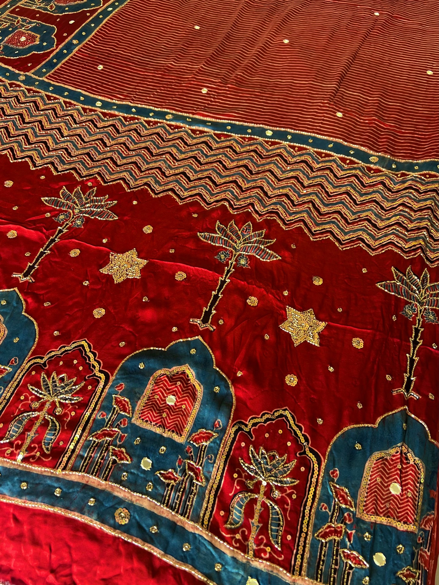 RUBY RADIANCE - Pure Modal Ajrakh Hand Embroidered Saree
