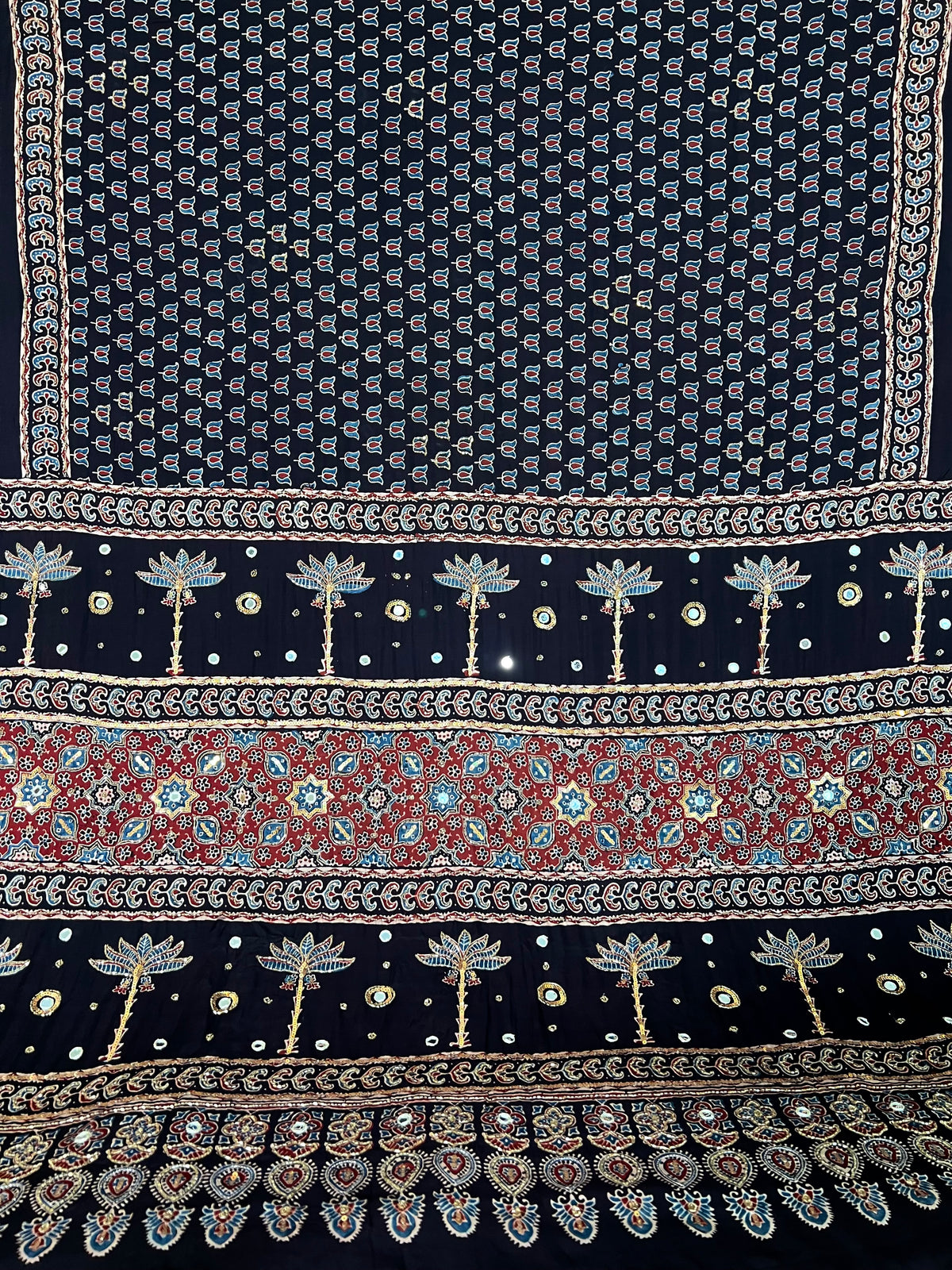 EBONY BLOSSOM - Pure Modal Ajrakh Hand Embroidered Saree