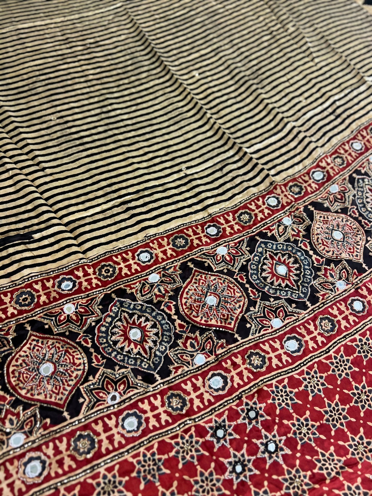 Cream and Black Striped Modal Ajrakh Hand Embroidered Saree with Red and Black Motifs