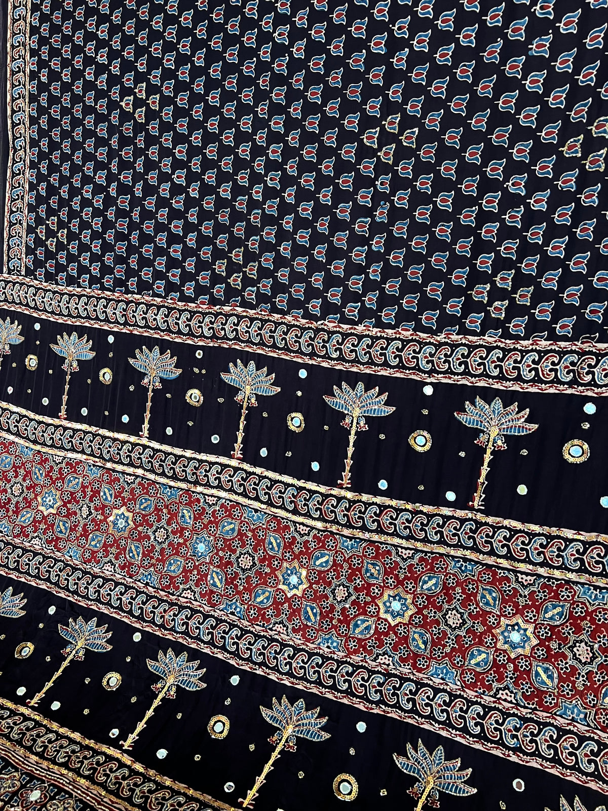 EBONY BLOSSOM - Pure Modal Ajrakh Hand Embroidered Saree