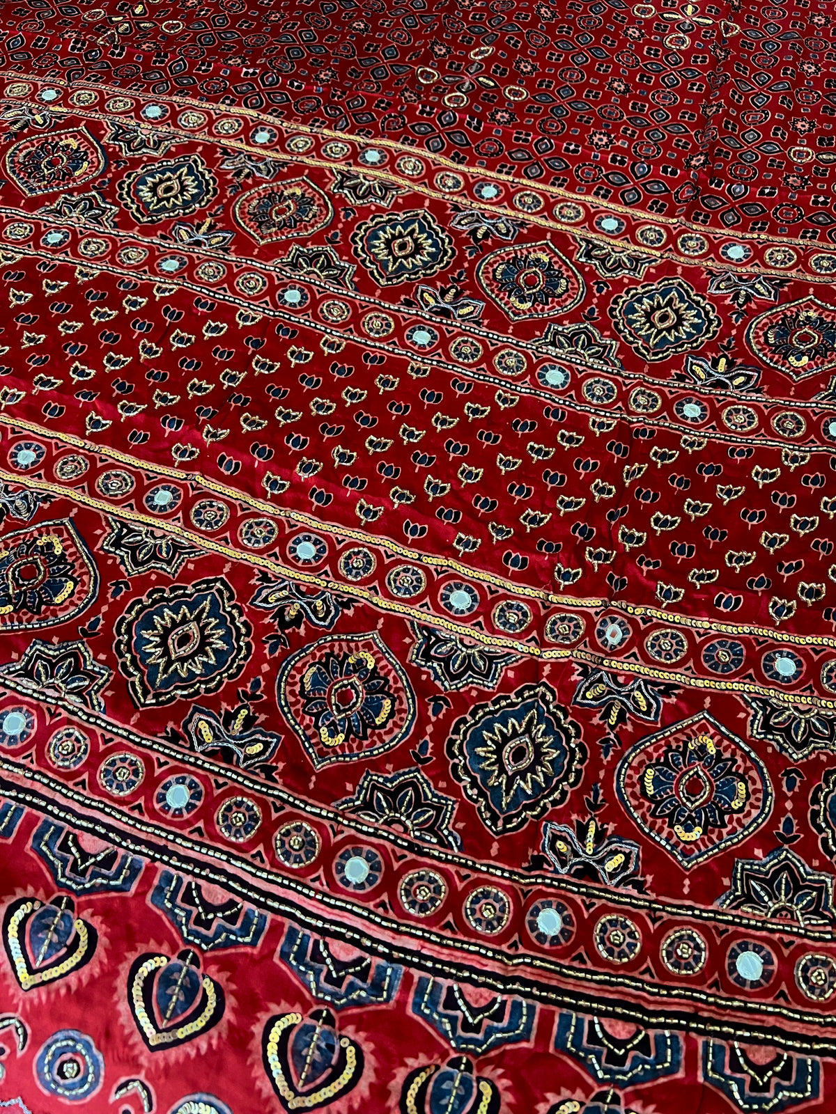 CRIMSON STARDUST - Pure Modal Ajrakh Hand Embroidered Saree