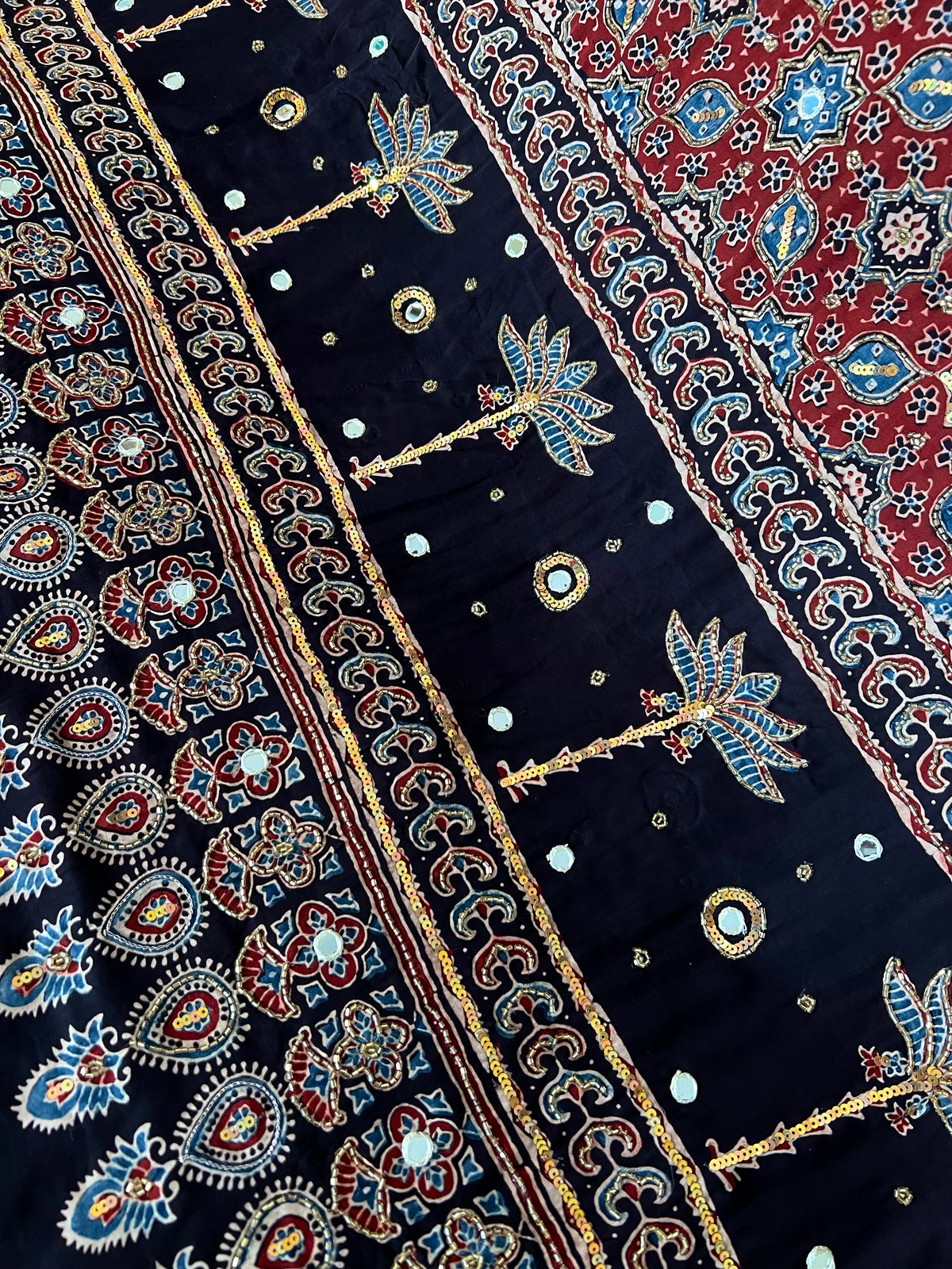 EBONY BLOSSOM - Pure Modal Ajrakh Hand Embroidered Saree