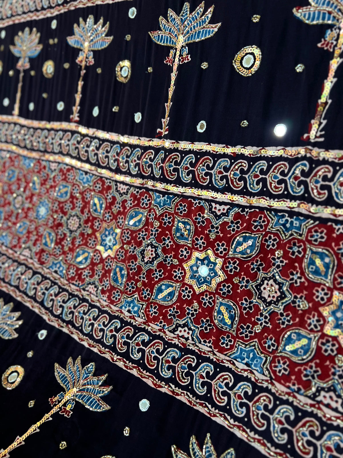 EBONY BLOSSOM - Pure Modal Ajrakh Hand Embroidered Saree