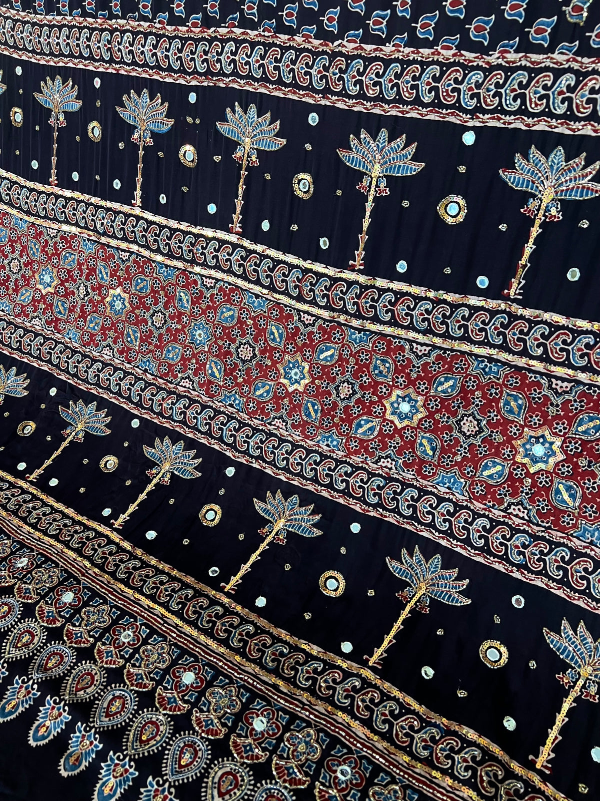 EBONY BLOSSOM - Pure Modal Ajrakh Hand Embroidered Saree