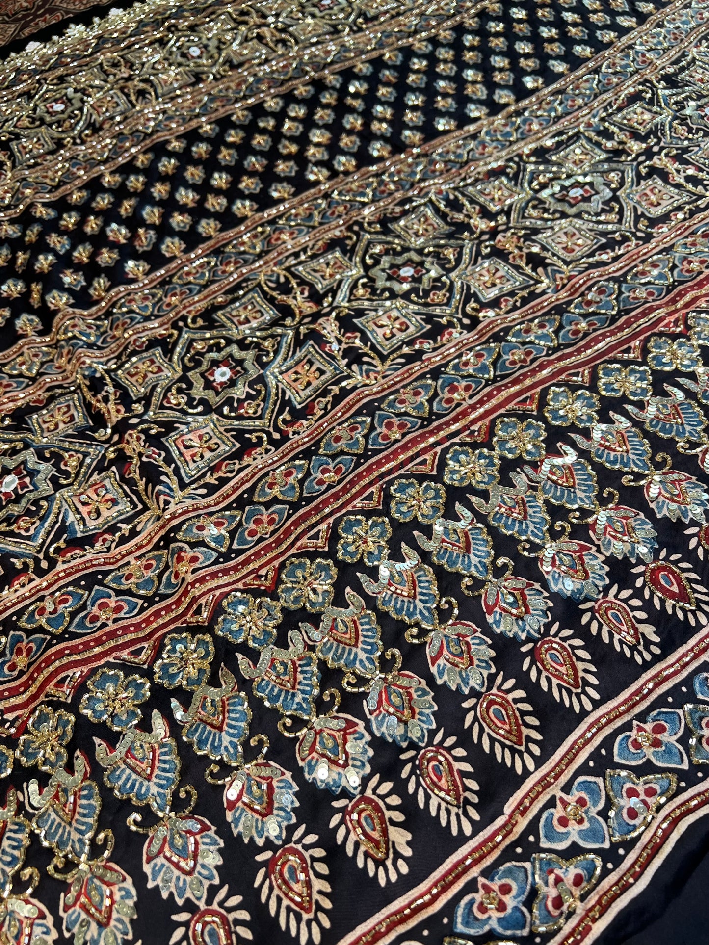 Rustic Hues - Pure Modal Ajrakh Hand Embroidered Saree