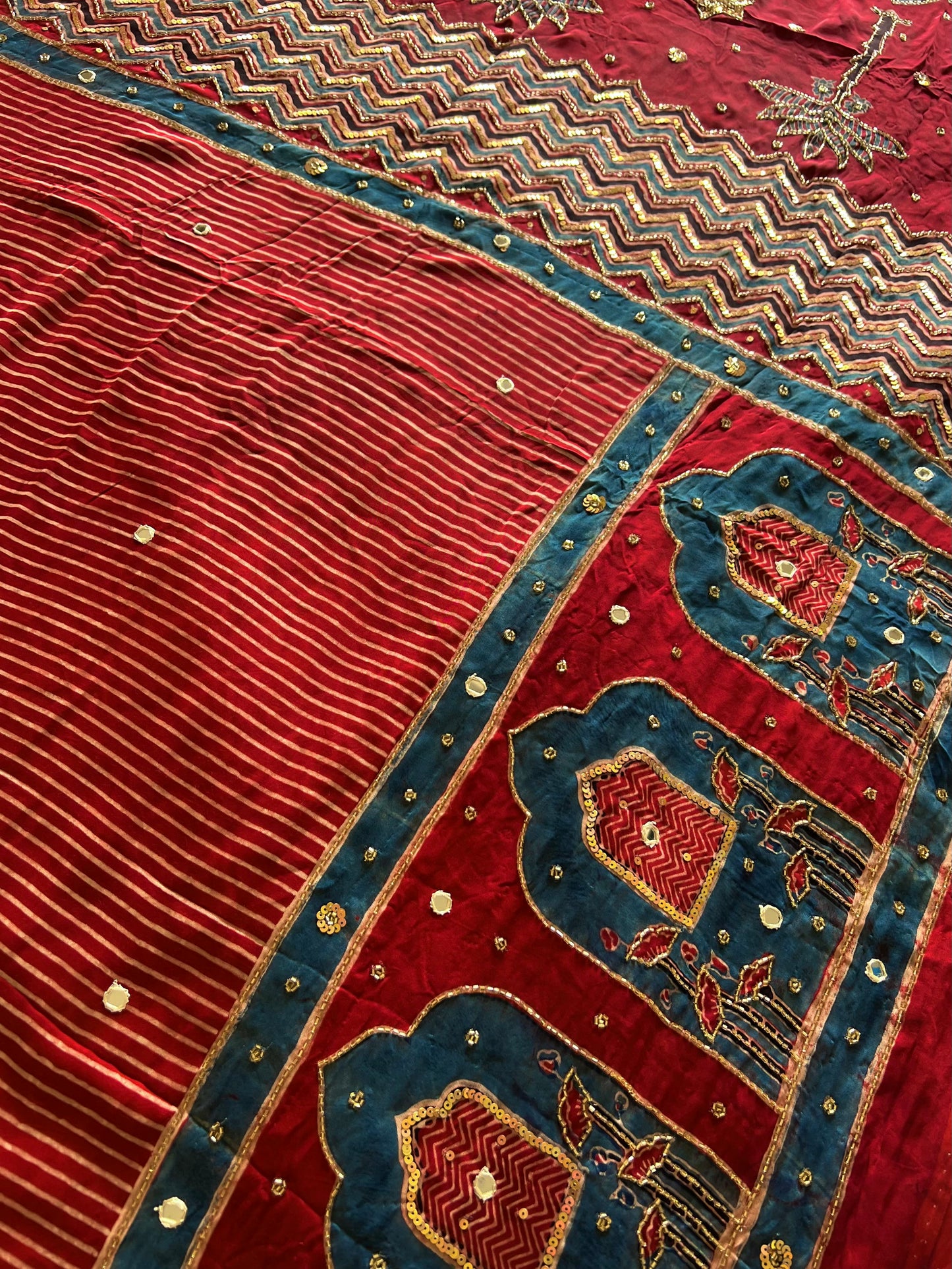 RUBY RADIANCE - Pure Modal Ajrakh Hand Embroidered Saree