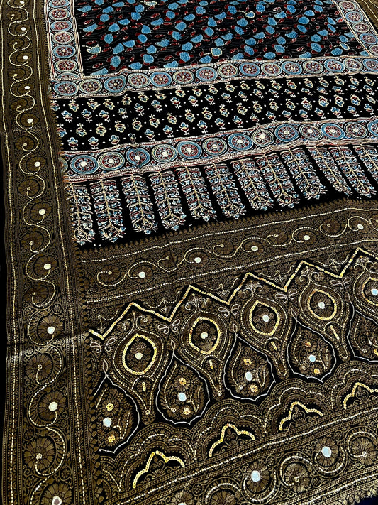 NOIR RADIANCE - Pure Dola Ajrakh Hand Embroidered Saree