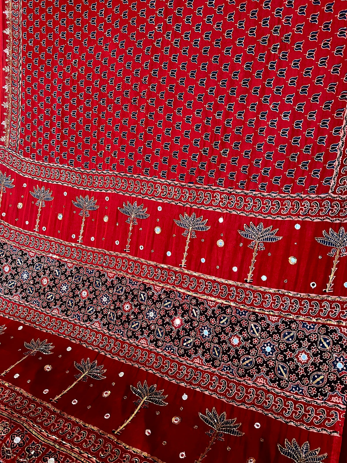 CRIMSON BLOSSOM - Pure Modal Ajrakh Hand Embroidered Saree