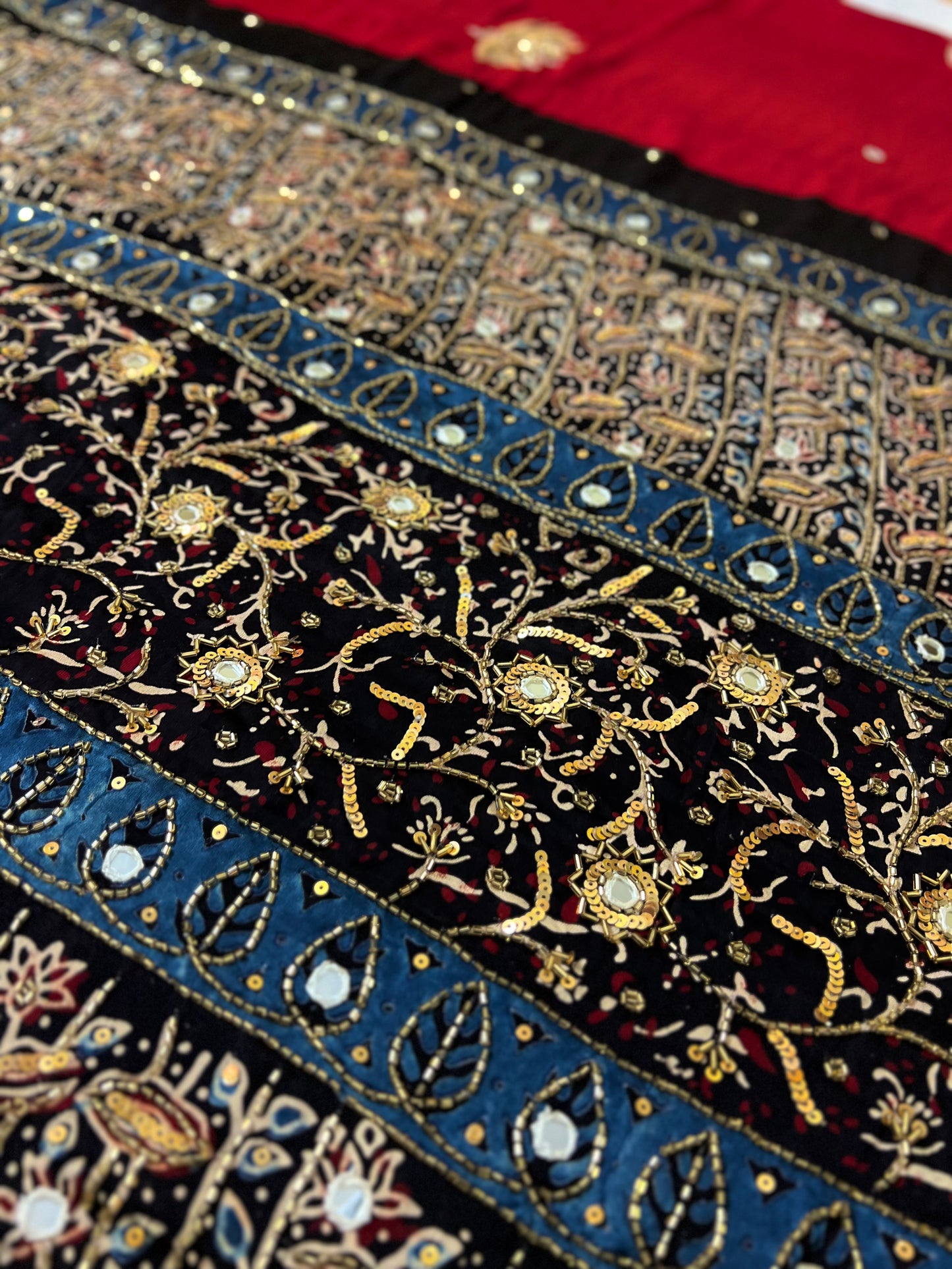 VERMILLION LOTUS - Pure Modal Ajrakh Hand Embroidered Saree