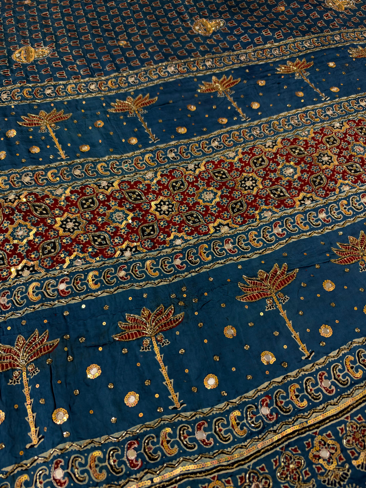 ETHEREAL BLOOM - Pure Modal Ajrakh Hand Embroidered Saree