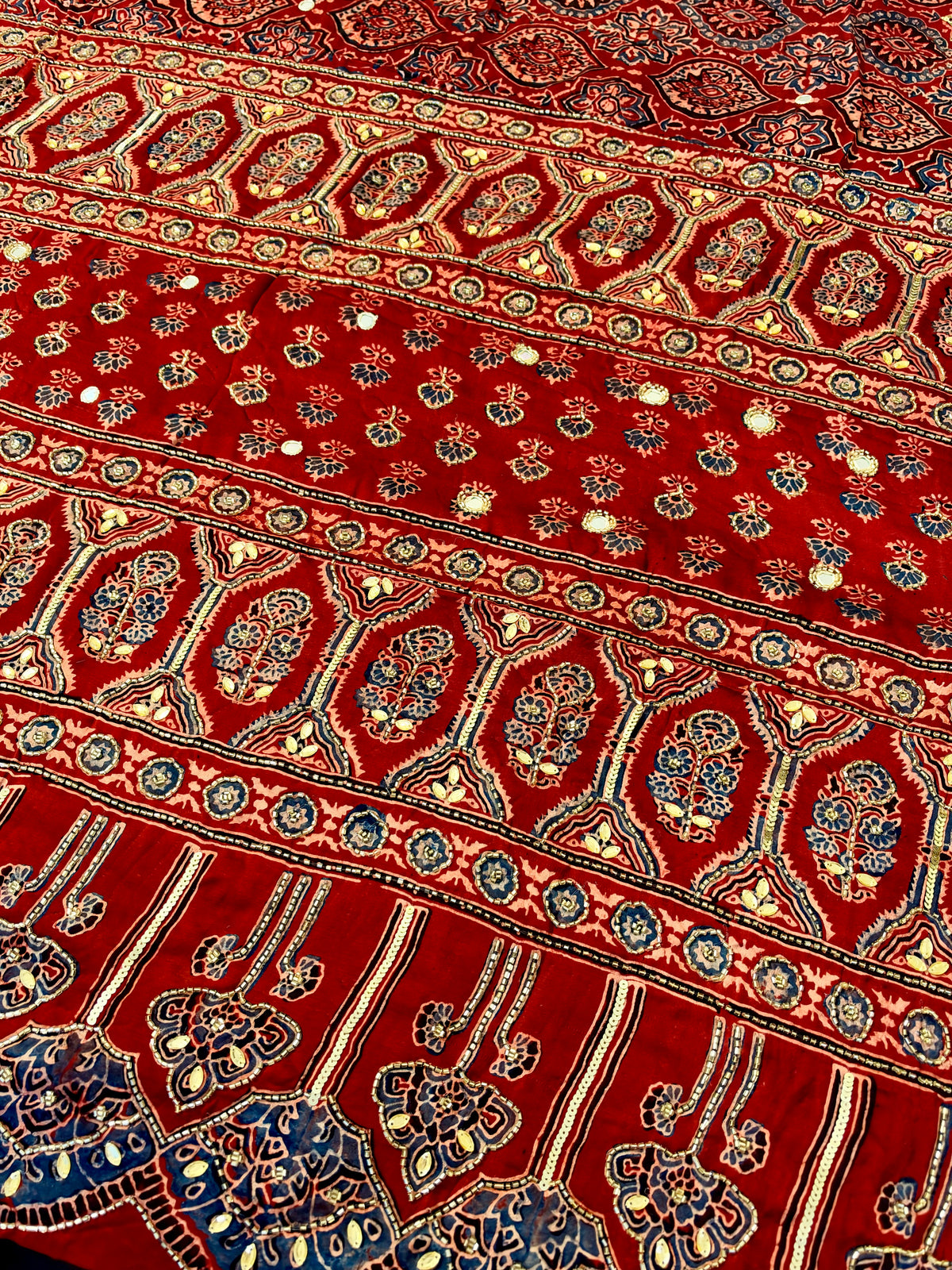RUBY SUNSET - Pure Modal Ajrakh Hand Embroidered Saree